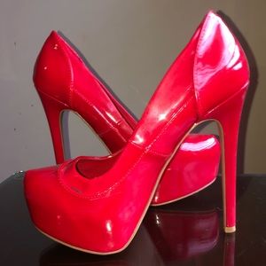 NEW RED PUMPS